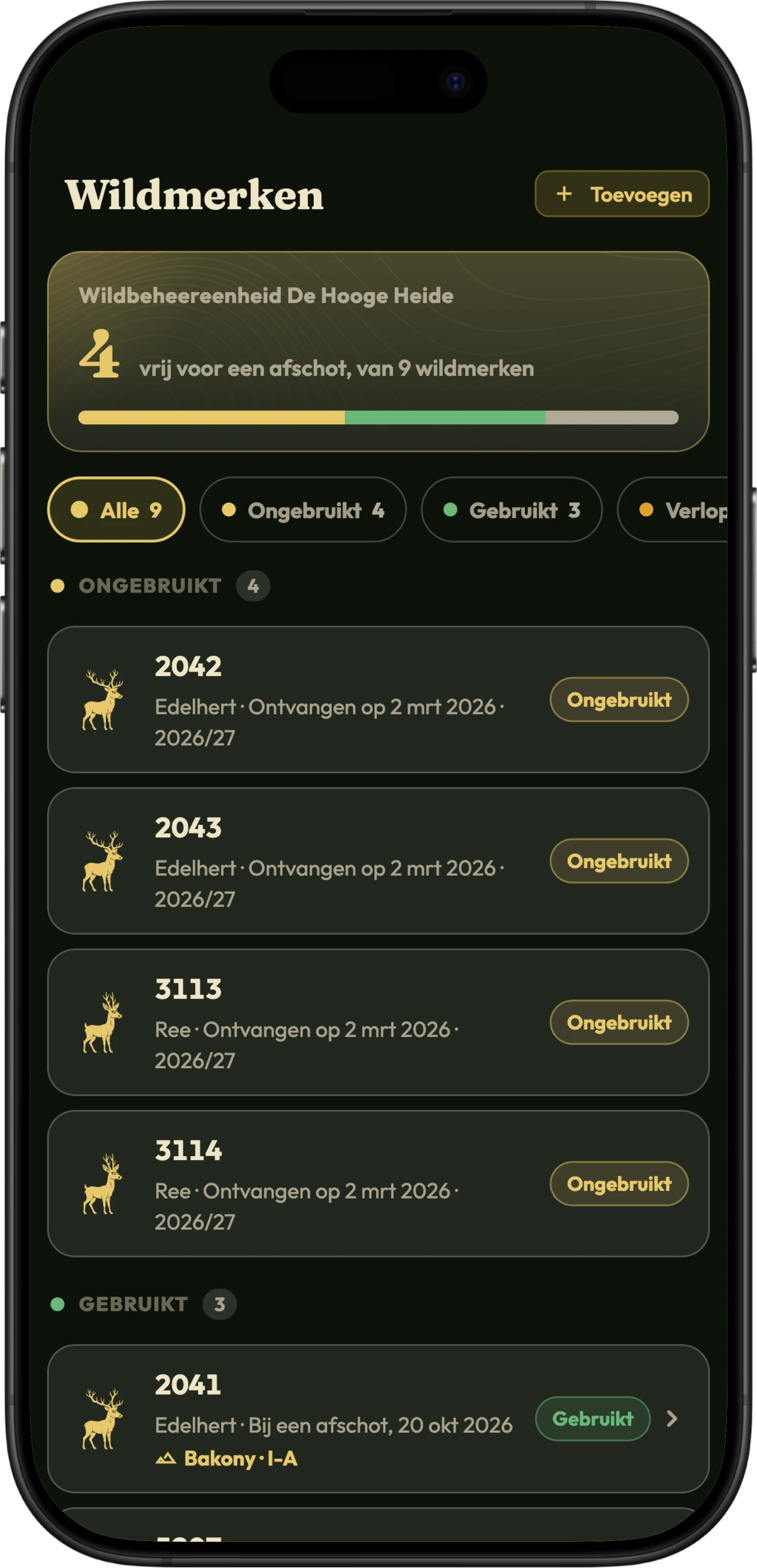 Het scherm met wildmerken in HunTracker op een iPhone, met ongebruikte merken en de merken die op afschoten zijn gebruikt